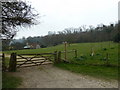 Footpath sign at Coombes