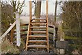 NZ2722 : Ladder stile for Great Aycliffe Footpath No 5 to cross the Heritage Rail Line by peter robinson