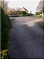 Footpath reaches road at Isington Close