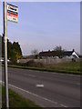 Cottages near bus stop in Bentley