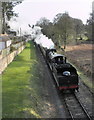 Ex GWR loco, No 2807 pulls away from Crowcombe, with a train bound for Minehead