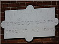 Dedication stone in the former church