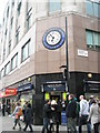 Clock between The Strand and Bedford Street