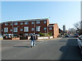 Approaching the junction of Church and Foster Roads