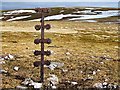 NN6681 : Old rusty fence post on Carn na Caim by wrobison