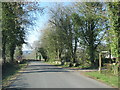 Road passes the start of the footpath to Cleddon