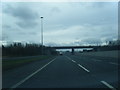 A550 looking west as A548 crosses on bridge