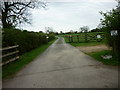TF0594 : The way to Mill Farm on Gulham Road, North Owersby by Ian S