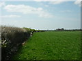 A footpath heading west to Glebe Farm