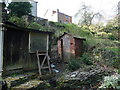 Old privy in a riverside garden in Kington