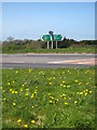 SW9148 : Direction sign on the A390 at Tregoose by Rod Allday