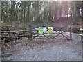 Many notices on this woodland access