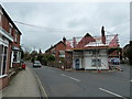 Scaffolding on a house at the "V" of Chapel Street and Windsor Road