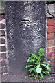 Benchmark on stone gatepost of St Denys Walmgate Church