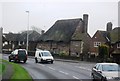 Thatched cottage by the A259