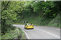 A car approaches a bend in the A623