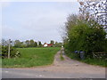 TM2869 : Footpath to Owl's Green & entrance to Brown's Farm by Geographer