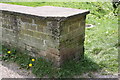 Benchmark on west parapet of bridge over Humber Ditch, Tirrold Way