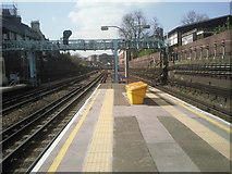 TQ2478 : Looking west from Barons Court station by Marathon