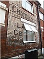 New window cut into an old sign in Manners Road