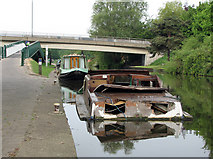 SK5639 : Nottingham Canal: sunken cabin cruiser by John Sutton