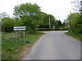 TG0524 : Reepham Road & Themelthorpe Village name sign by Geographer