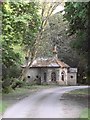 Lodge by the drive to St Giles House