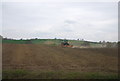 TQ5405 : Tractor, harrowing a field by N Chadwick