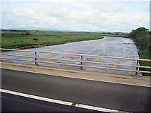 NY3564 : River Esk upstream from Metal Bridge by John Firth