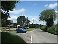 Junction of road to Woodford with B3177