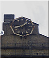 TQ3182 : Rusting clock face, Clerkenwell Road by Jim Osley