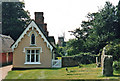 Thaxted: almshouses and windmill