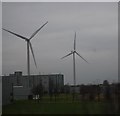 NZ2478 : Wind turbines, Windmill Industrial Estate by N Chadwick