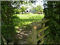 Stile, footpath sign and old barn, near Locko Lane Farm