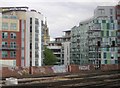 St James, Bermondsey, seen through new development from the train