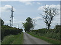 Road past transmission mast on Combe Hill