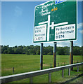 Signpost showing the layout of the B974 junction