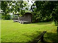 Cricket pavilion surrounded by fields