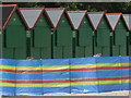 Mudeford: six beach huts and a windbreak