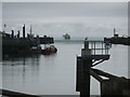 Newhaven: view down estuary towards outgoing ferry