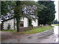 TG0523 : Gatehouse Cottage & Kerdiston Road by Geographer
