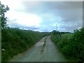 SW9445 : Road to Higher Barwick Farm by Alex McGregor