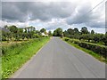 H9156 : Derrygavard Road by Kenneth  Allen