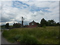 Barrow Hill Methodist Church and a derelict house