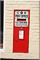 Post box on house, Church Street, North Creake