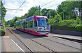 Midland Metro tram no. 10 entering Priestfield tram stop, Wolverhampton