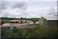 Caravans and trailers parked by the West Coast Main line