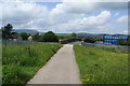 Path crossing the railway near Colne