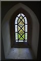 SU9013 : Window in porch of East Dean church by Shazz