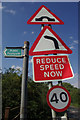 SK4639 : Signs at Stanton Bridge by Stephen McKay